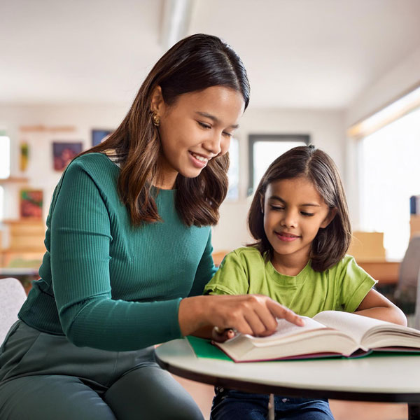 UVU after-school reading tutors with Elementary students