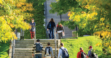 Students walking up the steps at UVU