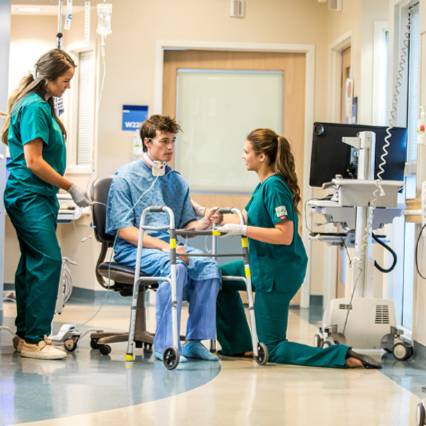 Doctors speaking with a patient