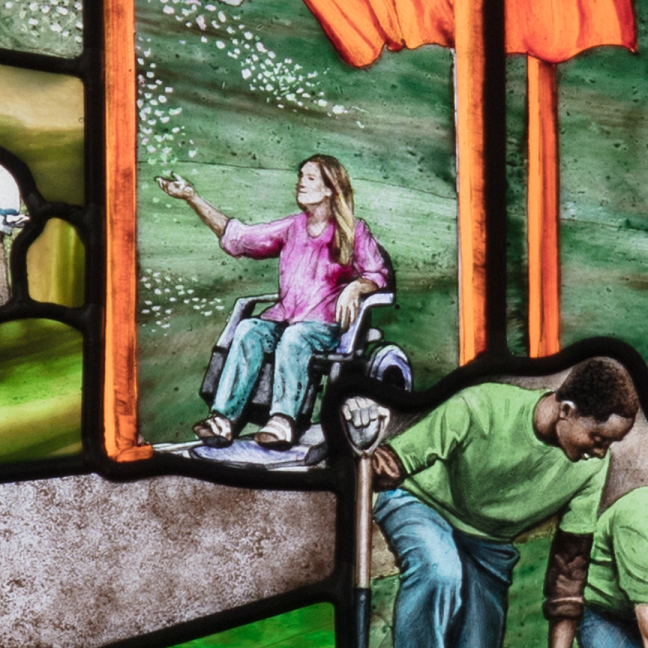 Roots of Knowledge panel depicting a girl in a wheelchair.