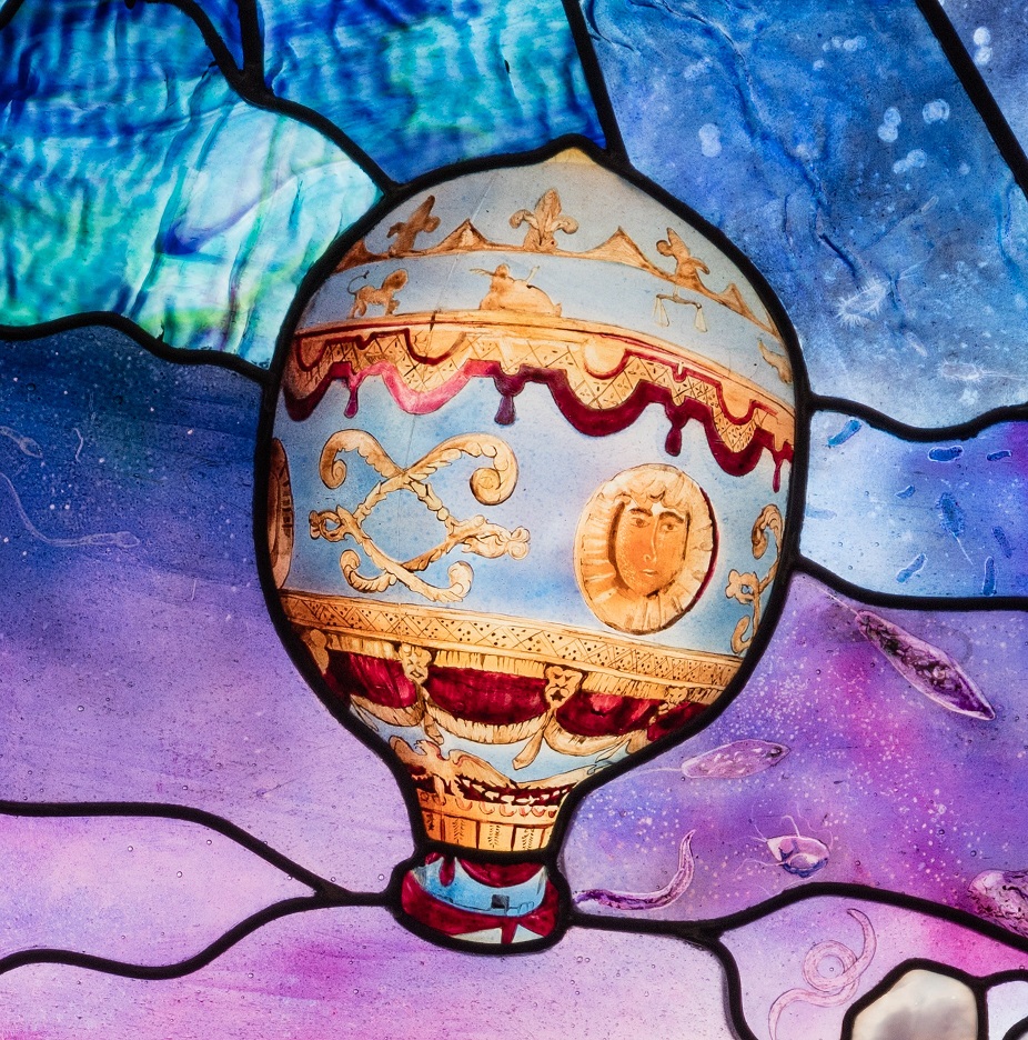 Roots of Knowledge panel depicting a hot air balloon.