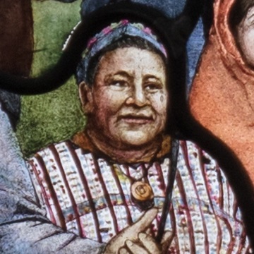 Roots of Knowledge panel depicting a hispanic woman.