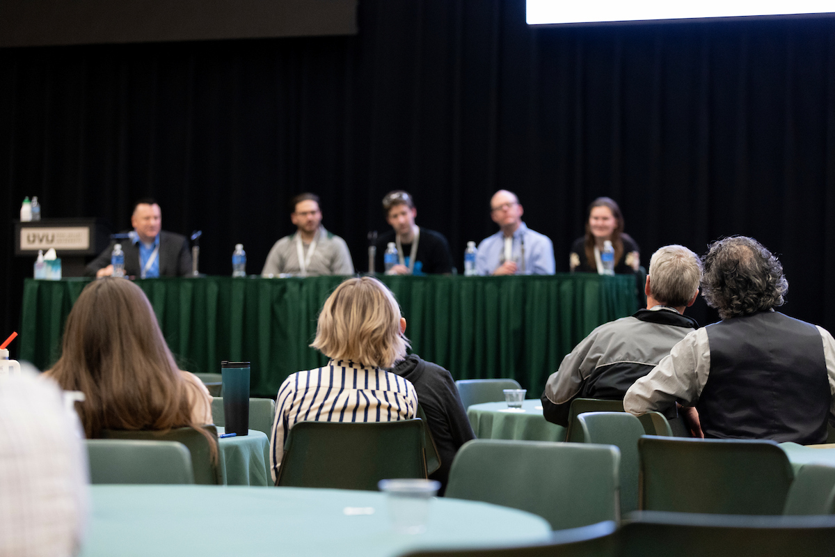 people at a conference panel