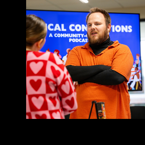 Student meeting with social impact fellow