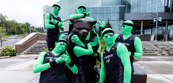 UVU Green Man Group posing