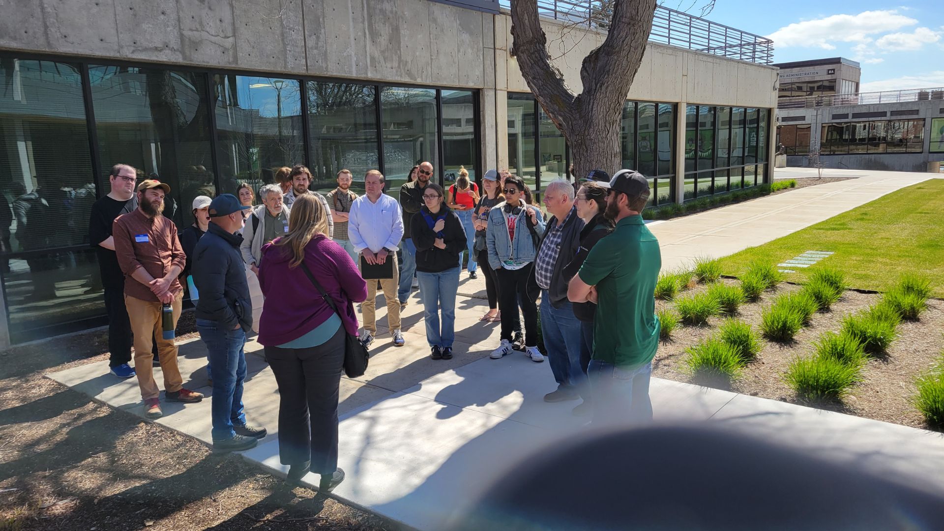 A group of people at the UVU Fountain Plaza