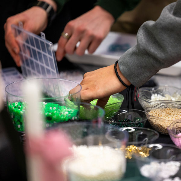 UVU students creating rings at The Zone event