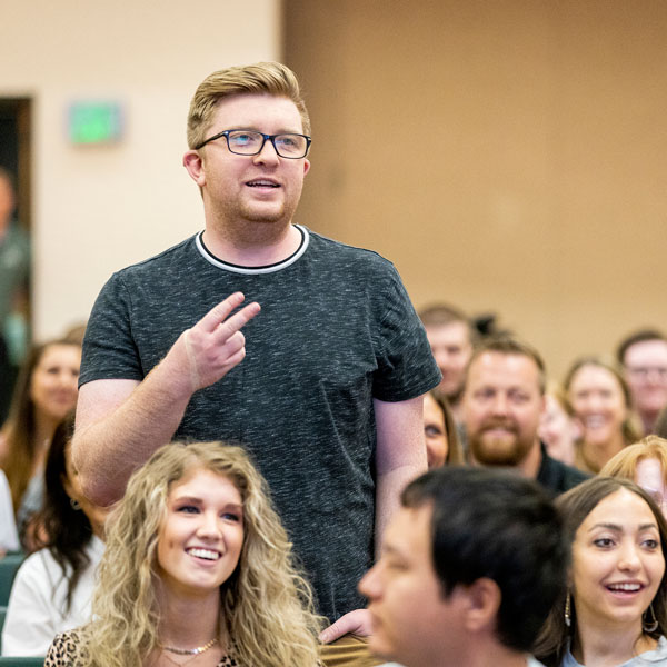 UVU Student talking from the audience at an event