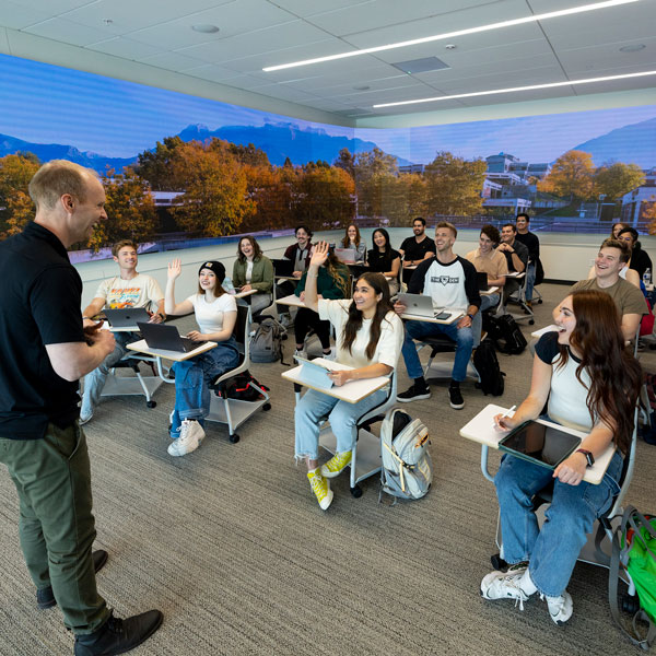 Student participating in a department discussion on campus