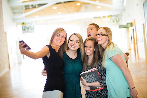 Students taking a selfie on campus