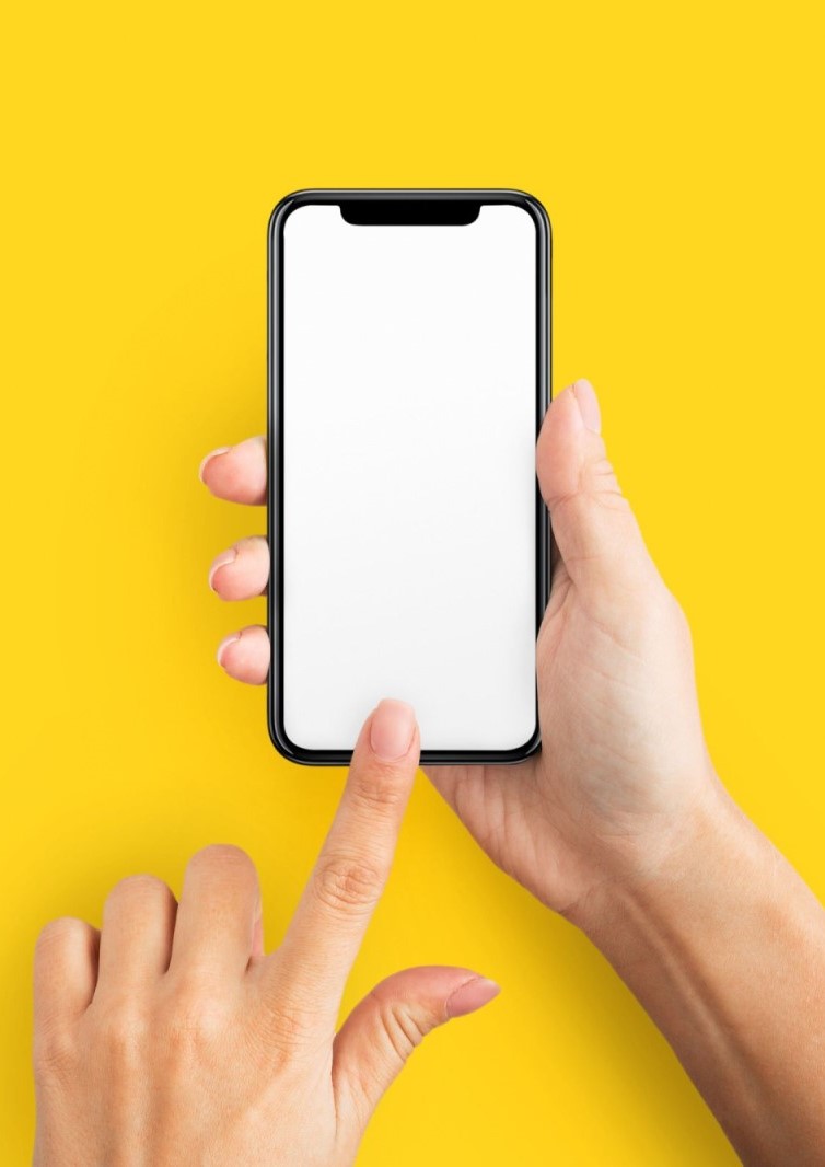 yellow background with person holding up a smartphone