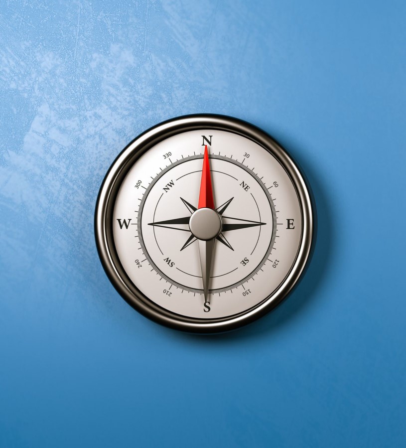 blue background with compass