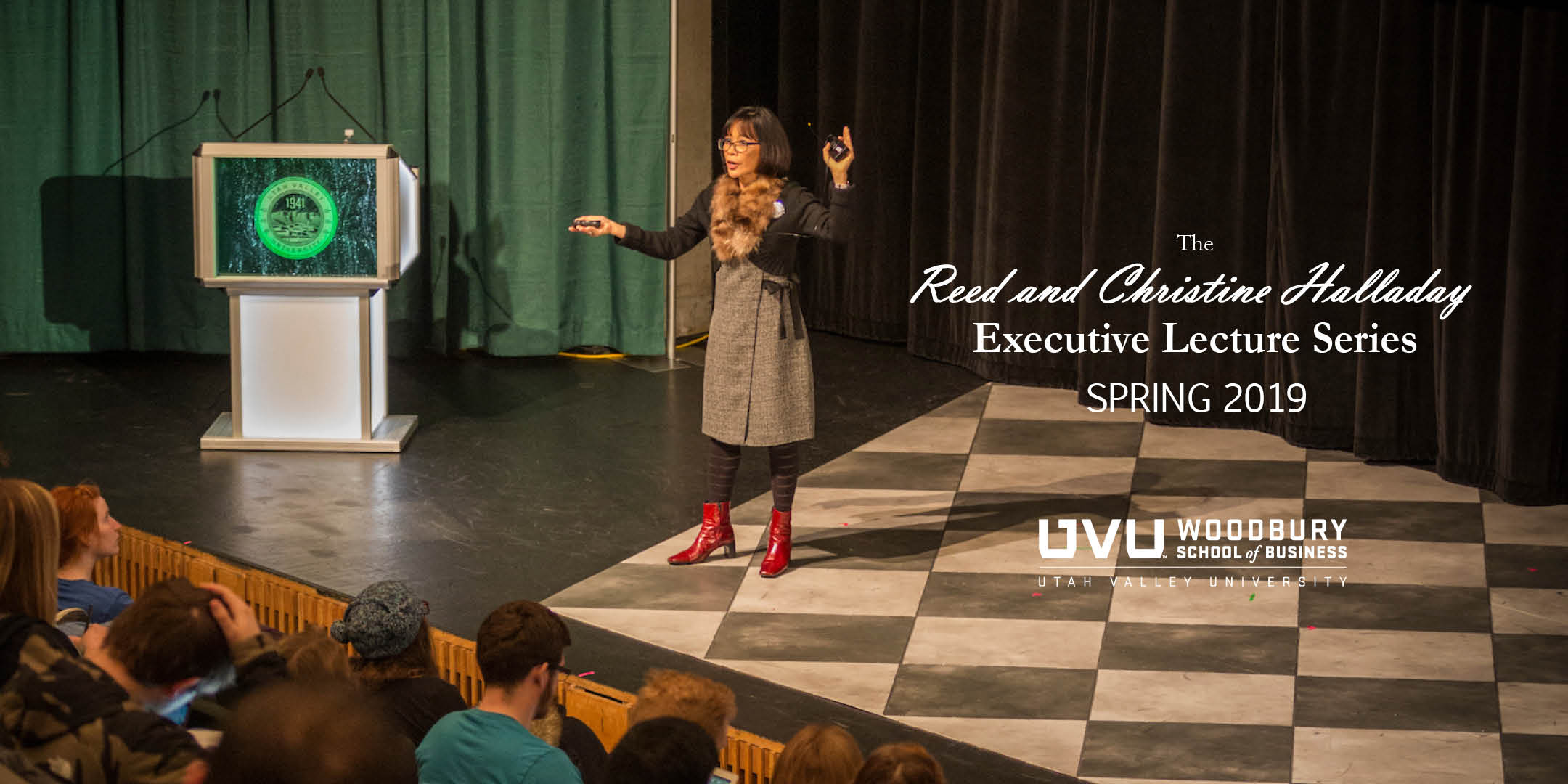 President Tuminez speaking at The Reed and Christine Halladay Executive Lecture Series, Woodbury School of Business Logo